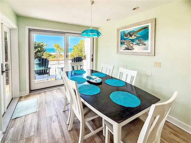 a table and a dining room with furniture window