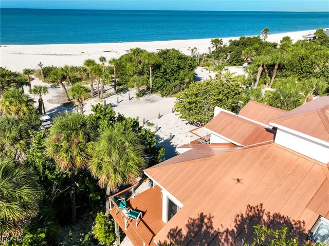 a view of a yard with an outdoor seating