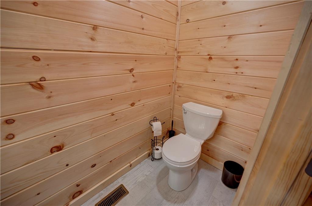 2092 Pleasant Hill Road Northeast Ranger, GA 30734 - Photo 17 of 87 a bathroom with a toilet and a shower