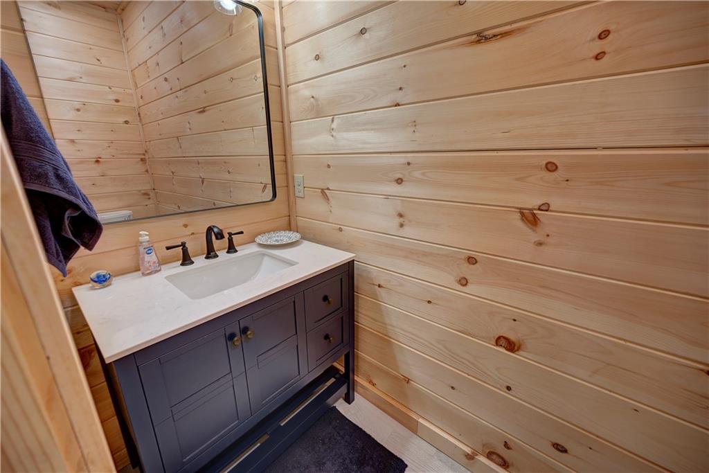 2092 Pleasant Hill Road Northeast Ranger, GA 30734 - Photo 17 of 88 a bathroom with a sink and a mirror