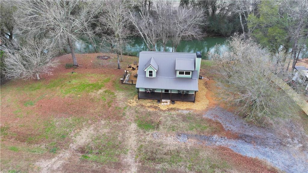 2092 Pleasant Hill Road Northeast Ranger, GA 30734 - Photo 2 of 88 a view of a back yard of the house