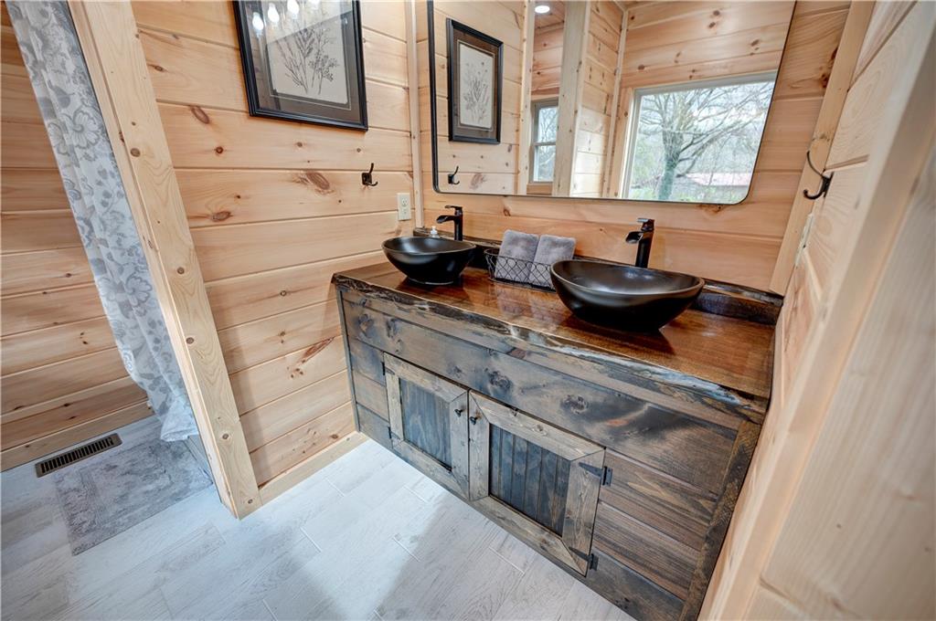 2092 Pleasant Hill Road Northeast Ranger, GA 30734 - Photo 23 of 87 a kitchen with a stove and a window