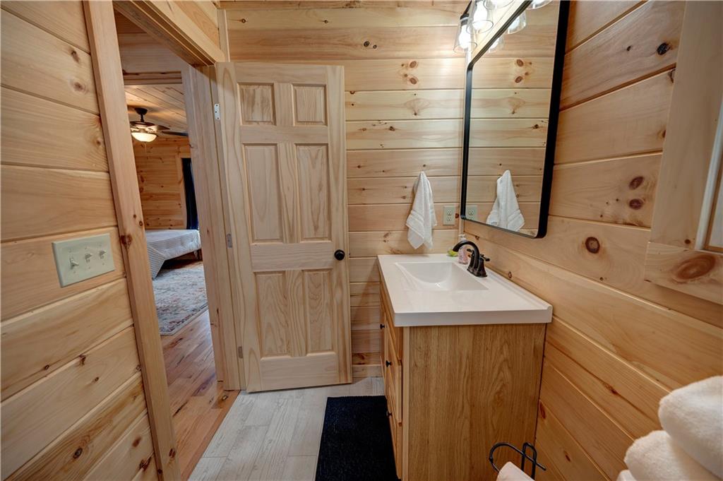 2092 Pleasant Hill Road Northeast Ranger, GA 30734 - Photo 36 of 87 a bathroom with a sink and mirror