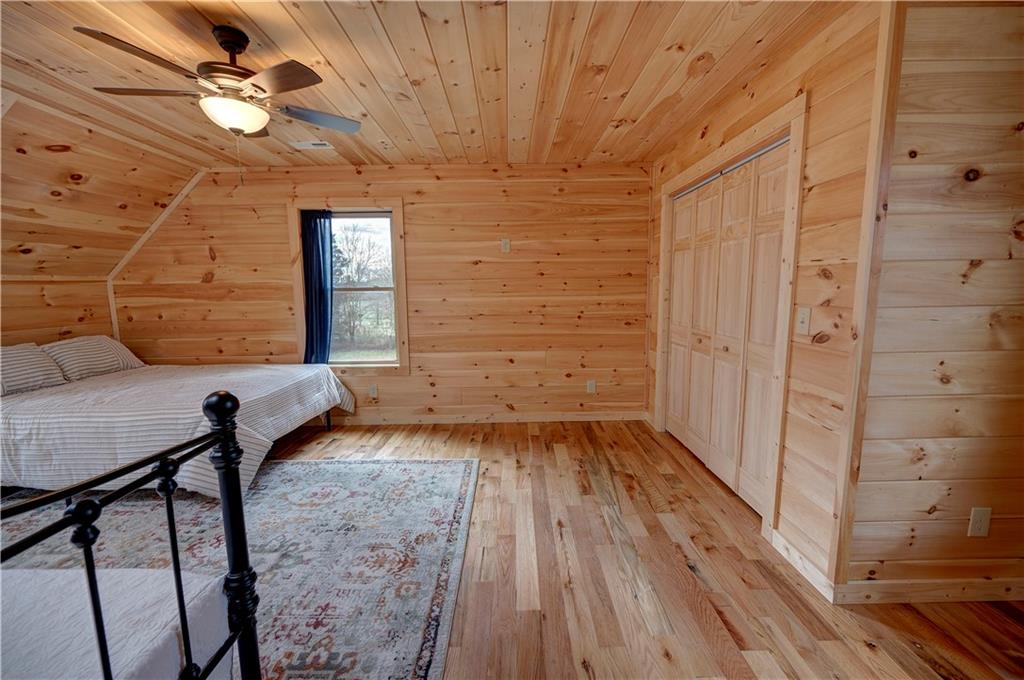 2092 Pleasant Hill Road Northeast Ranger, GA 30734 - Photo 38 of 88 a view of a livingroom with hardwood floor and hallway