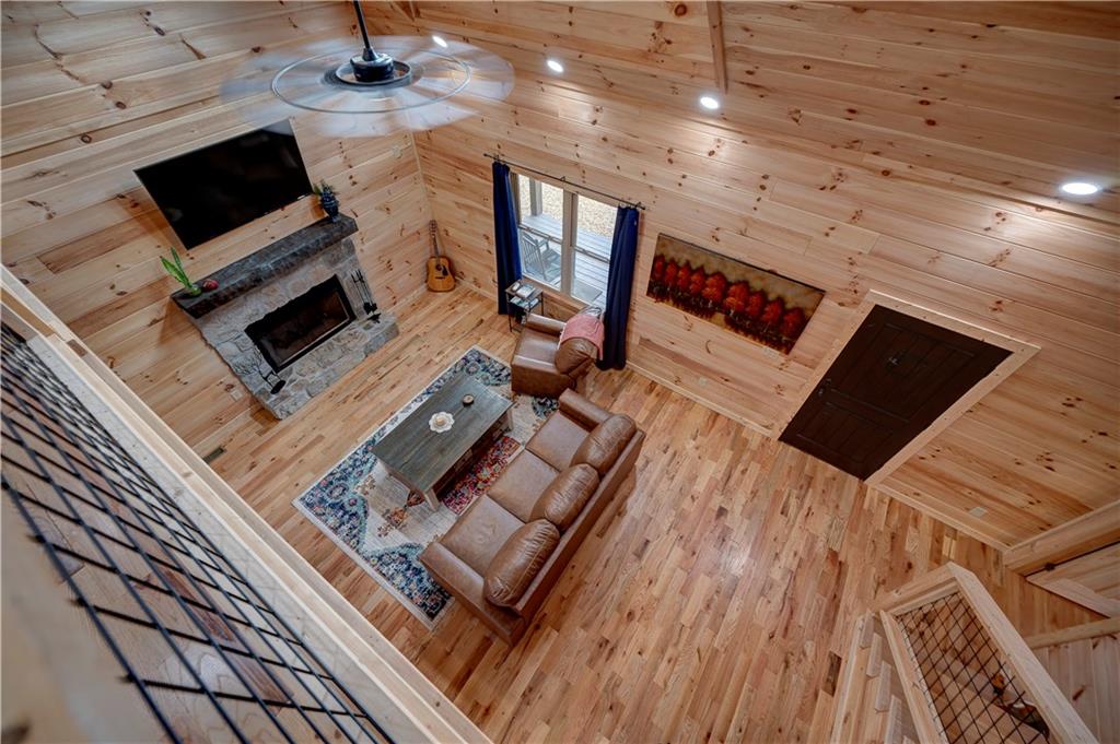 2092 Pleasant Hill Road Northeast Ranger, GA 30734 - Photo 40 of 87 a living room with furniture and a flat screen tv