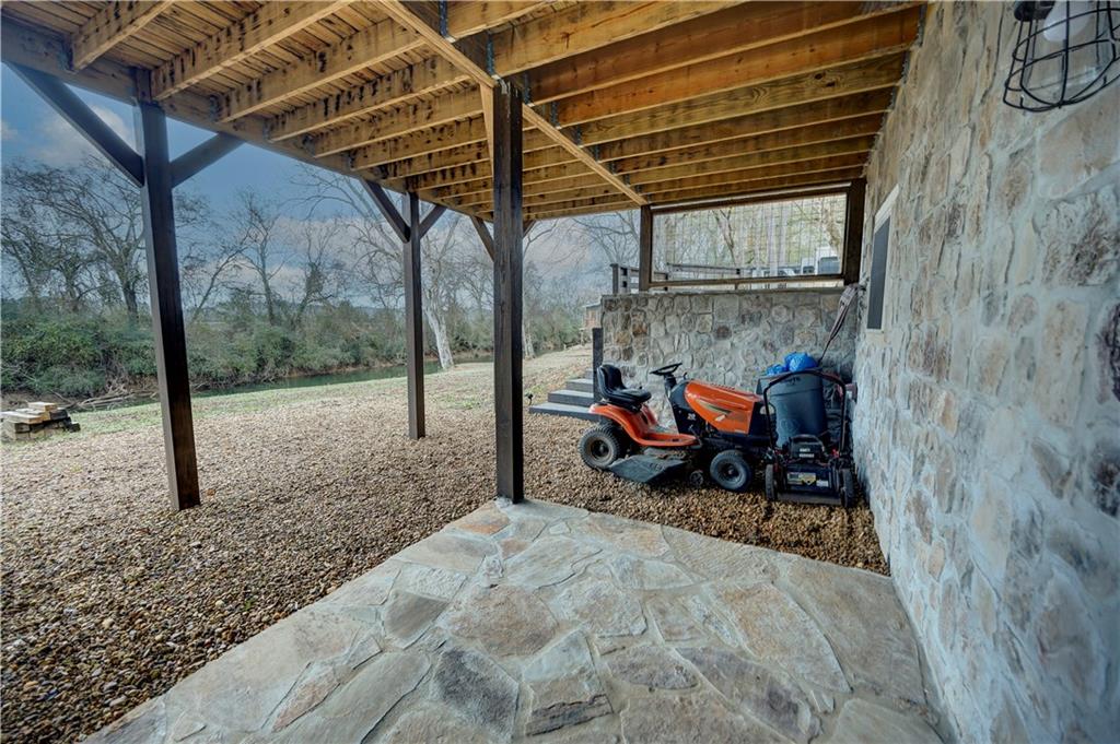 2092 Pleasant Hill Road Northeast Ranger, GA 30734 - Photo 48 of 87 a backyard of a house with seating space