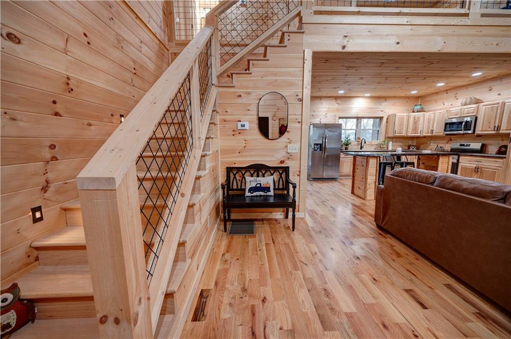 2092 Pleasant Hill Road Northeast Ranger, GA 30734 - Photo 5 of 87 a living room with furniture and a fireplace
