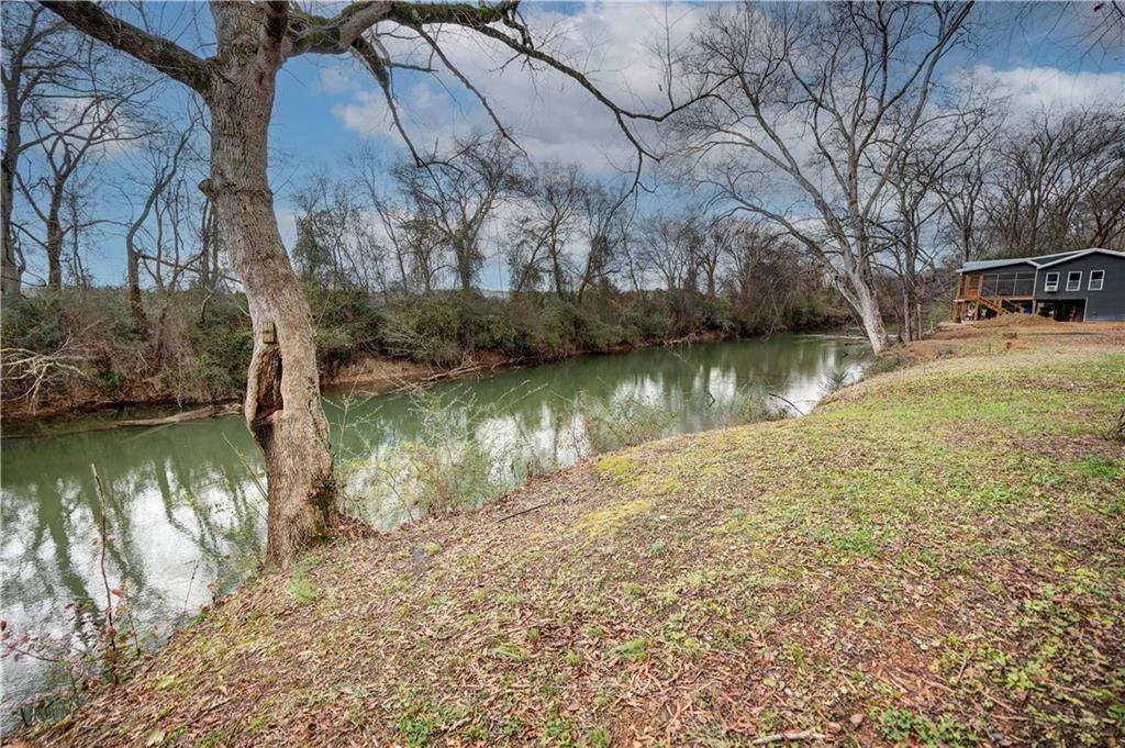 2092 Pleasant Hill Road Northeast Ranger, GA 30734 - Photo 54 of 88 a view of a lake with houses