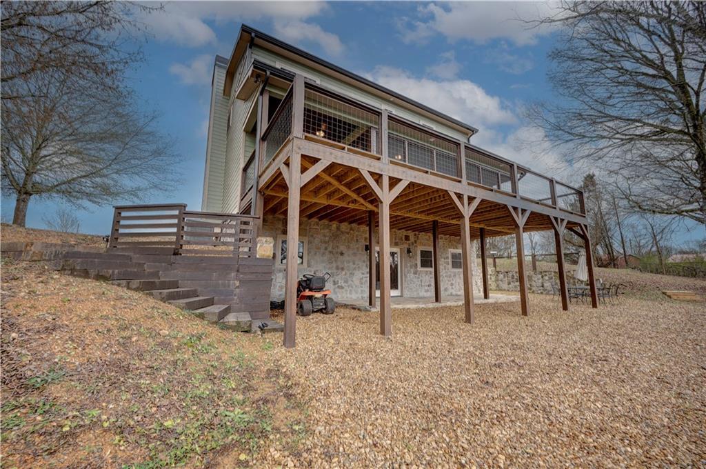 2092 Pleasant Hill Road Northeast Ranger, GA 30734 - Photo 58 of 88 a view of a house with a yard