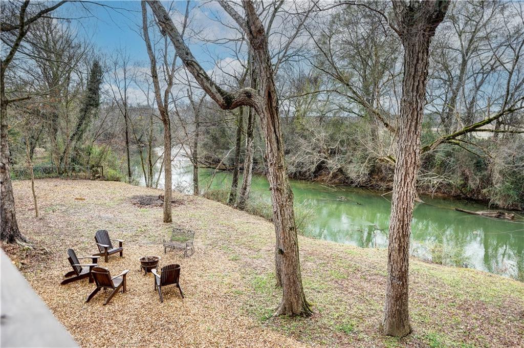2092 Pleasant Hill Road Northeast Ranger, GA 30734 - Photo 64 of 88 a lake view with a bench