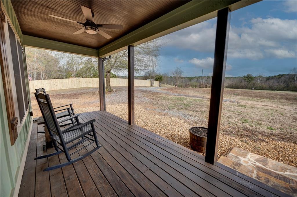 2092 Pleasant Hill Road Northeast Ranger, GA 30734 - Photo 69 of 88 a view of a porch with wooden floor