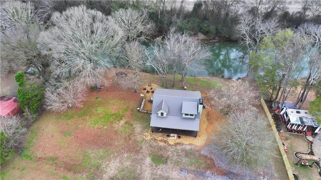 2092 Pleasant Hill Road Northeast Ranger, GA 30734 - Photo 71 of 87 an aerial view of a house with a yard