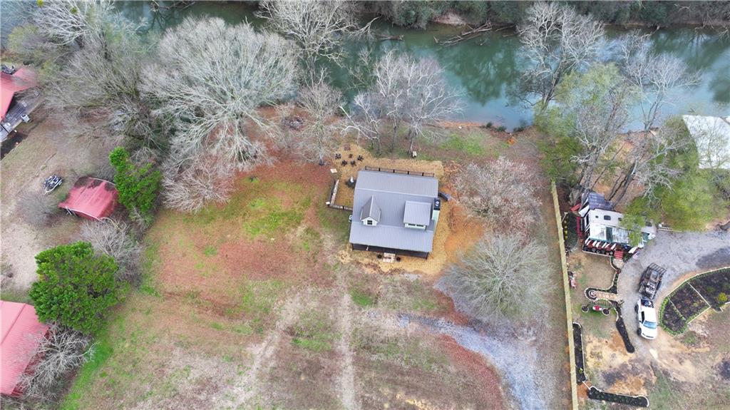 2092 Pleasant Hill Road Northeast Ranger, GA 30734 - Photo 72 of 87 a aerial view of a house with a yard