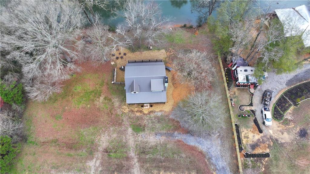 2092 Pleasant Hill Road Northeast Ranger, GA 30734 - Photo 81 of 87 a backyard of a house with lots of green space