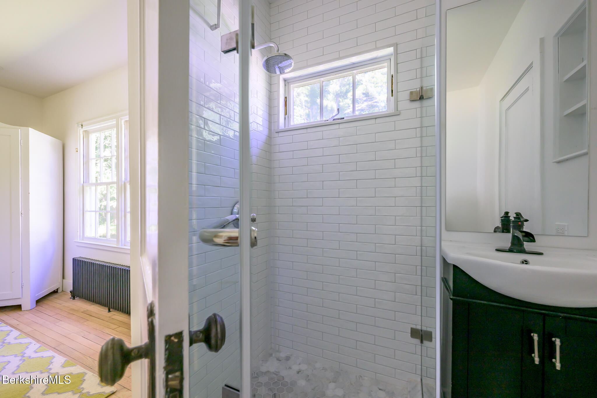 18 Creamery Road Egremont, MA 01230 - Photo 15 of 31 a bathroom with a sink a mirror and a shower