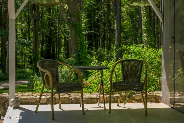 a view of a chair in a garden