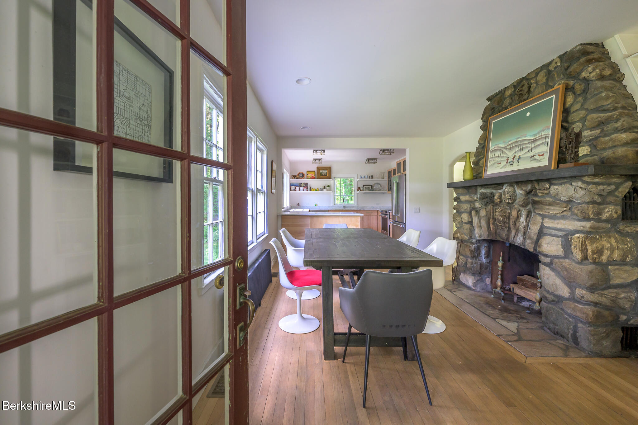 18 Creamery Road Egremont, MA 01230 - Photo 5 of 31 a view of a dining room with furniture a fireplace and wooden floor