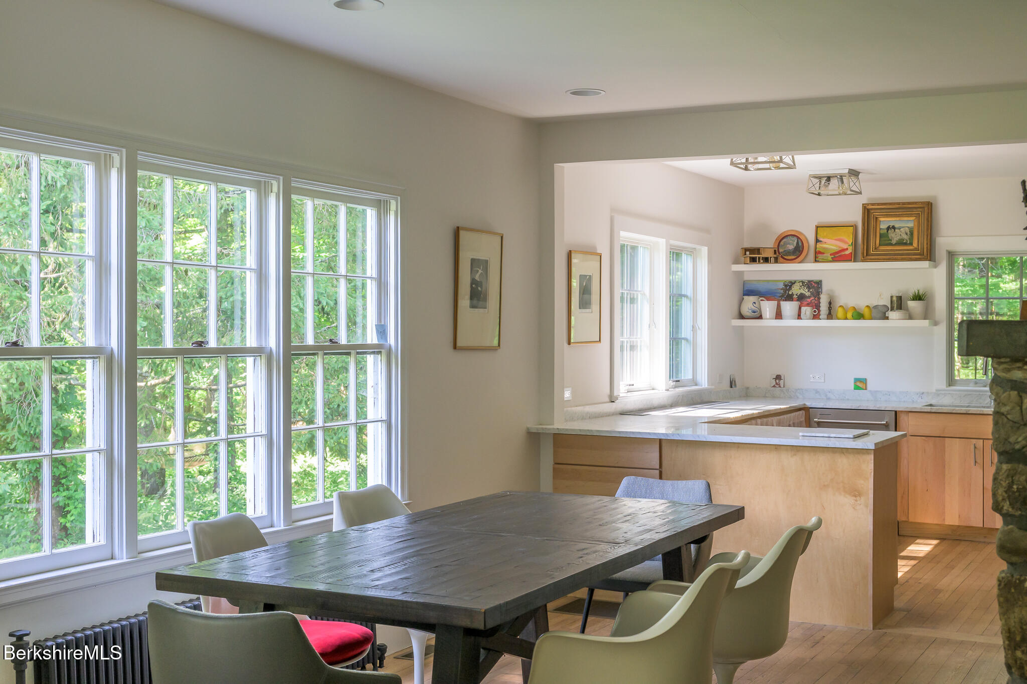 18 Creamery Road Egremont, MA 01230 - Photo 9 of 31 a kitchen with a stove a sink dishwasher and white cabinets with wooden floor
