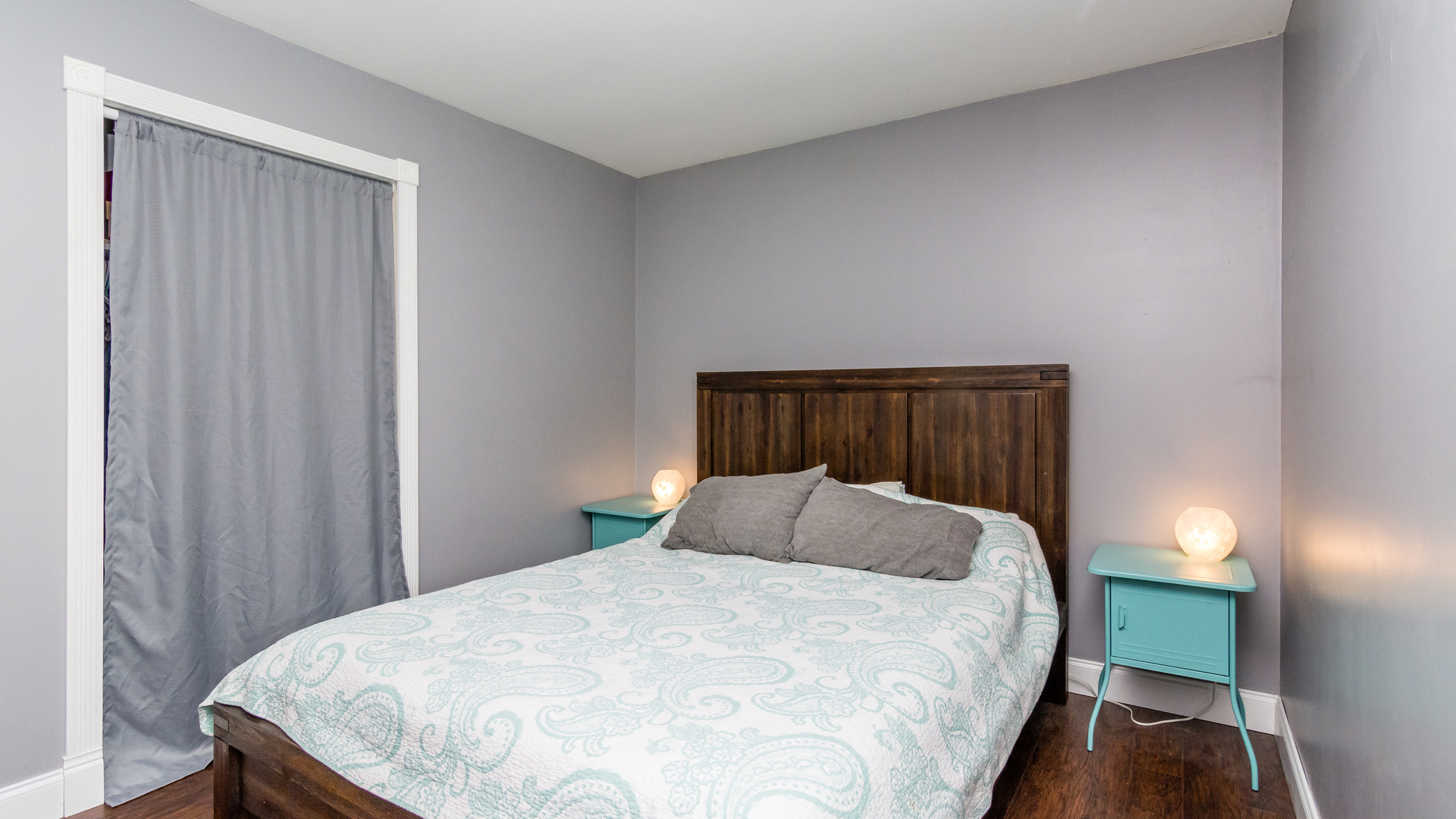 313 Healy Avenue Romeoville, IL 60446 - Photo 18 of 24 a bedroom with a bed and wooden floor