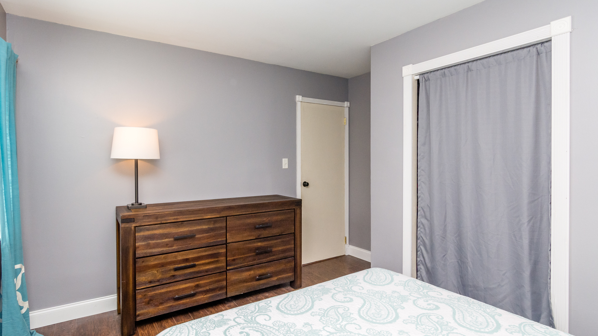 313 Healy Avenue Romeoville, IL 60446 - Photo 19 of 24 a bedroom with a bed and a lamp