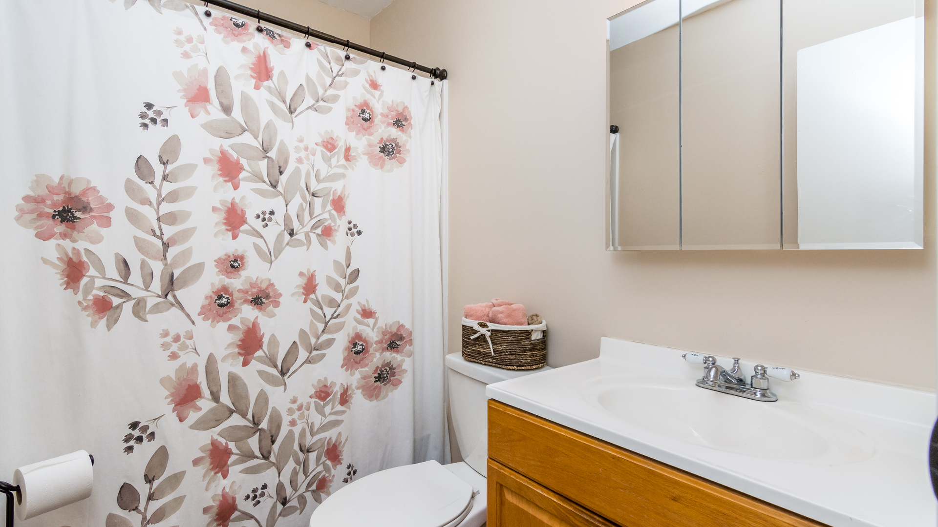 313 Healy Avenue Romeoville, IL 60446 - Photo 22 of 24 a bathroom with a sink toilet and shower curtain