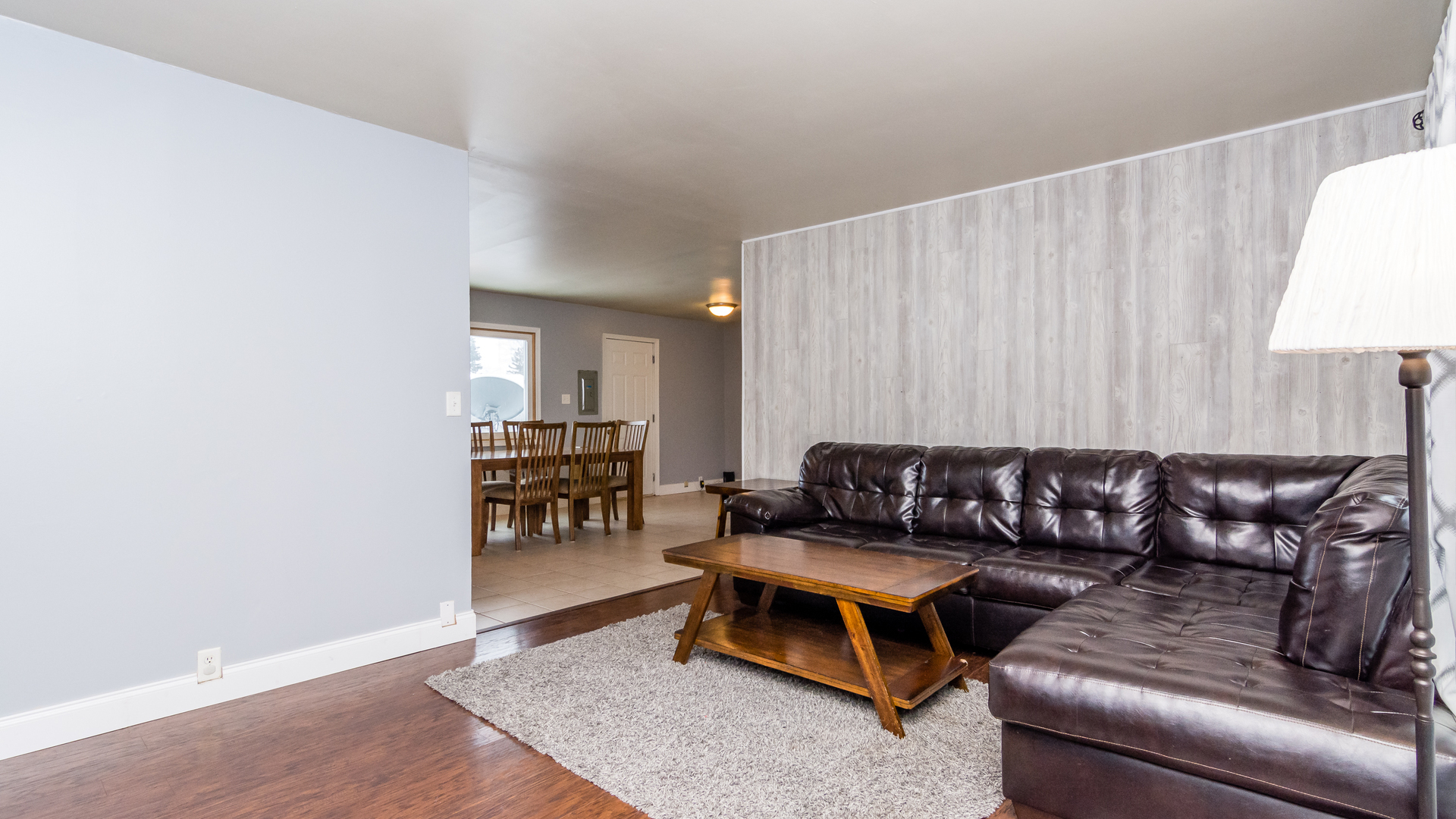 313 Healy Avenue Romeoville, IL 60446 - Photo 4 of 24 a living room with furniture and a couch