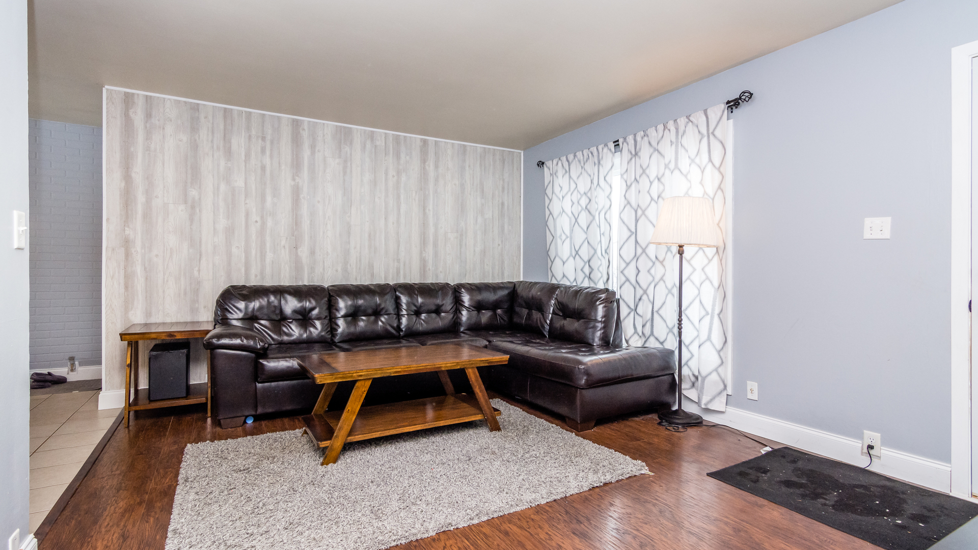 313 Healy Avenue Romeoville, IL 60446 - Photo 5 of 24 a living room with furniture and a window