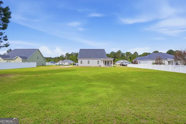 a house view with a garden space