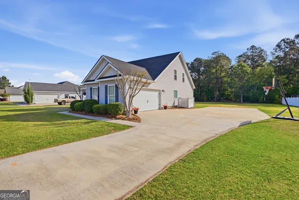 a view of outdoor space yard and front view of a house