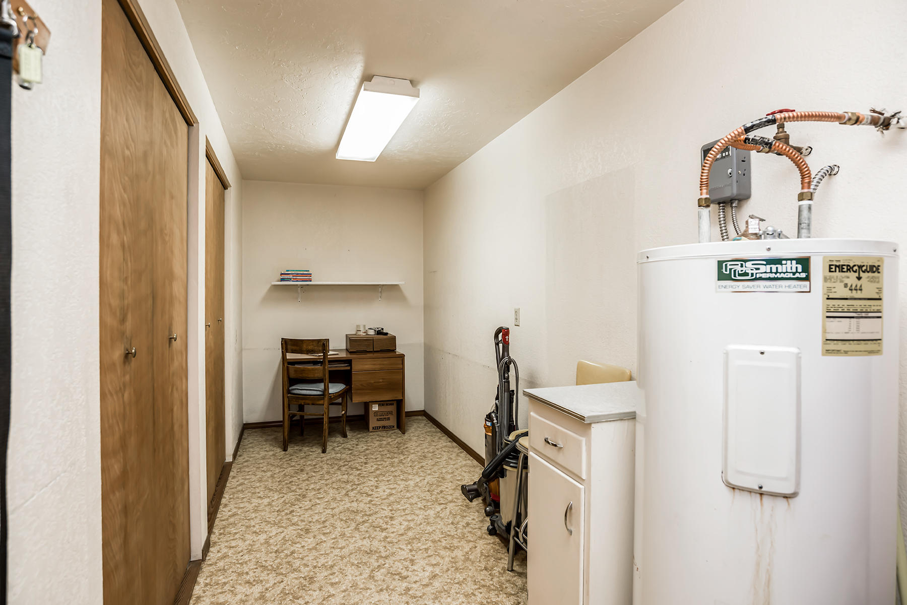 14557 Crossroads Loop Sisters, OR 97759 - Photo 10 of 25 Large laundry/storage room with pantry