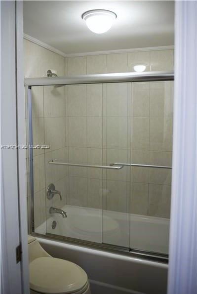100 Lincoln Road, Unit 1440 Miami Beach, FL 33139 - Photo 11 of 27 a bathroom with a shower and a toilet