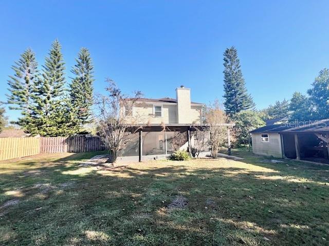 2146 Kimberwicke Circle Oviedo, FL 32765 - Photo 17 of 20 a view of a house with a yard