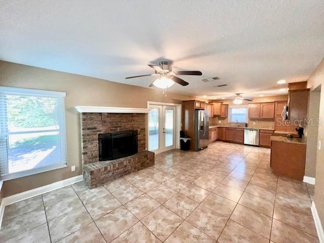 2146 Kimberwicke Circle Oviedo, FL 32765 - Photo 5 of 20 a view of a kitchen with furniture and a fireplace