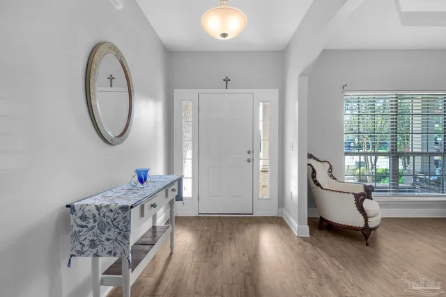 a living room with furniture and a window