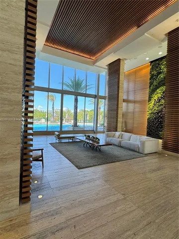 a view of swimming pool with outdoor seating