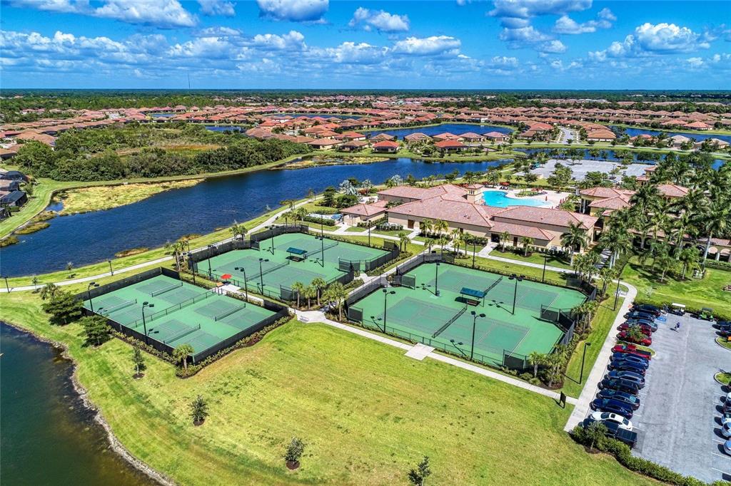 12434 Amica Loop Venice, FL 34293 - Photo 49 of 74 an aerial view of a house with a ocean view