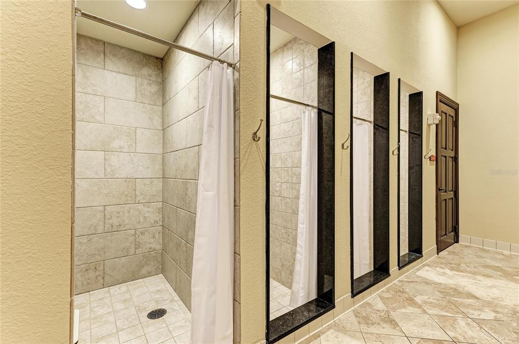 12434 Amica Loop Venice, FL 34293 - Photo 69 of 74 a bathroom with a shower and a glass door