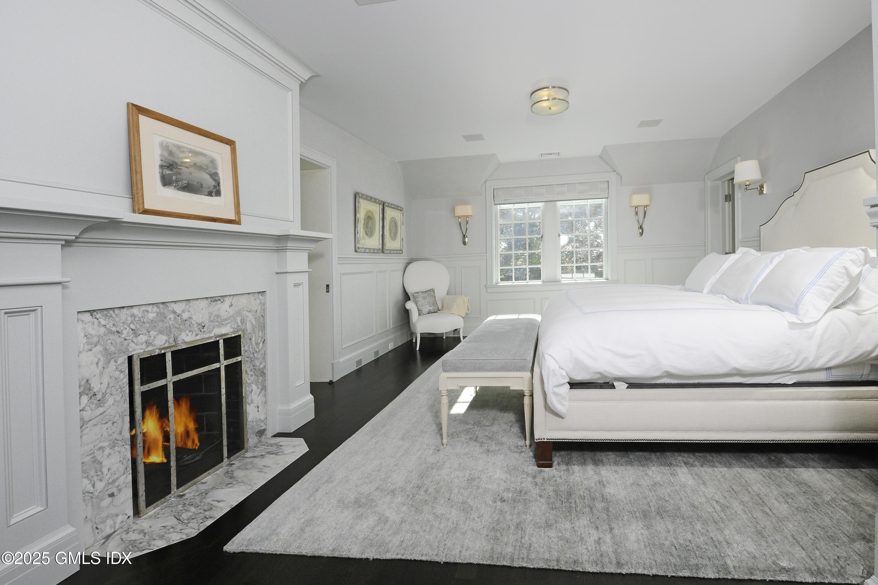 47 Carriglea Drive Riverside, CT 06878 - Photo 13 of 26 a bedroom with a bed and a fireplace