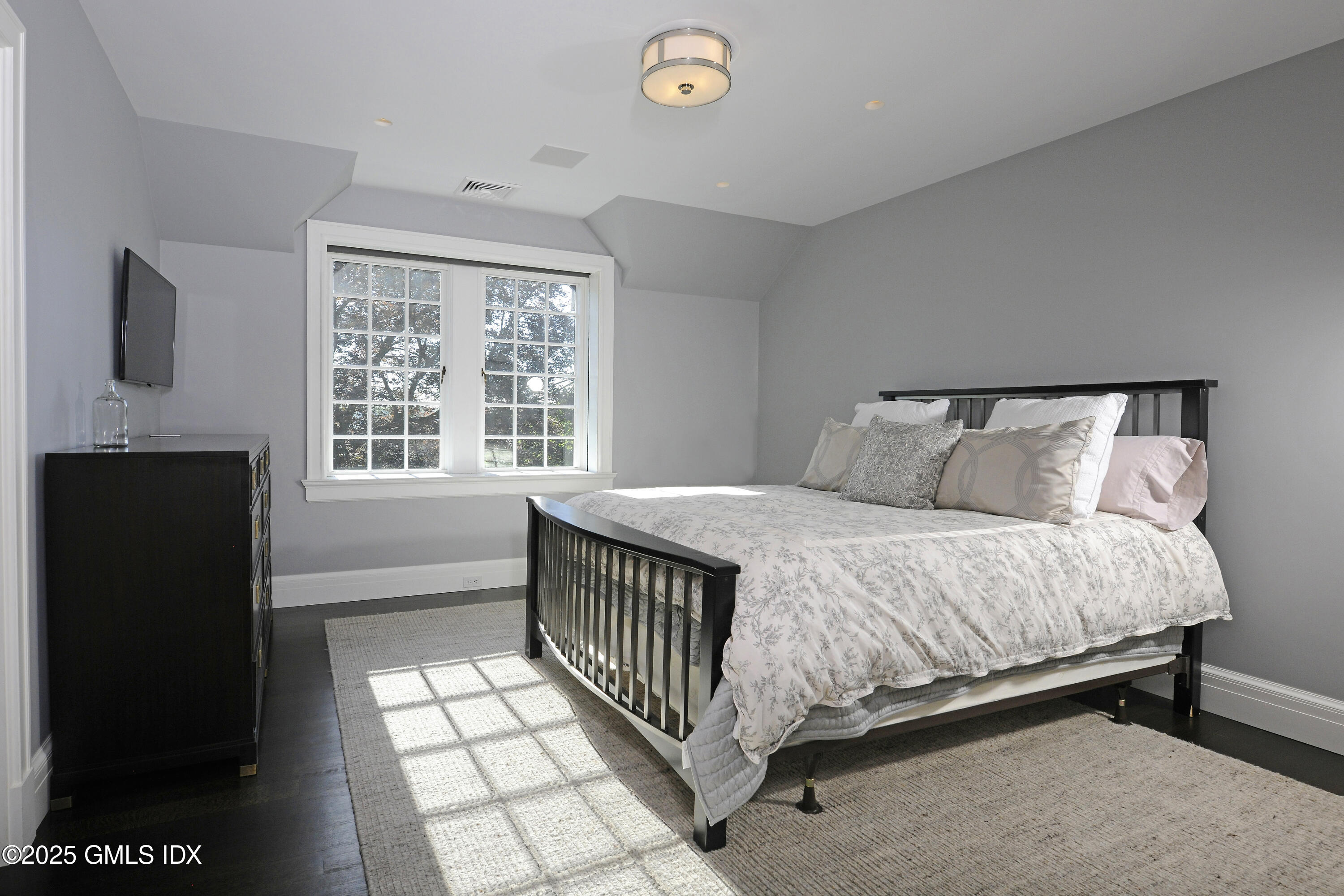 47 Carriglea Drive Riverside, CT 06878 - Photo 16 of 26 a bedroom with a bed and a window