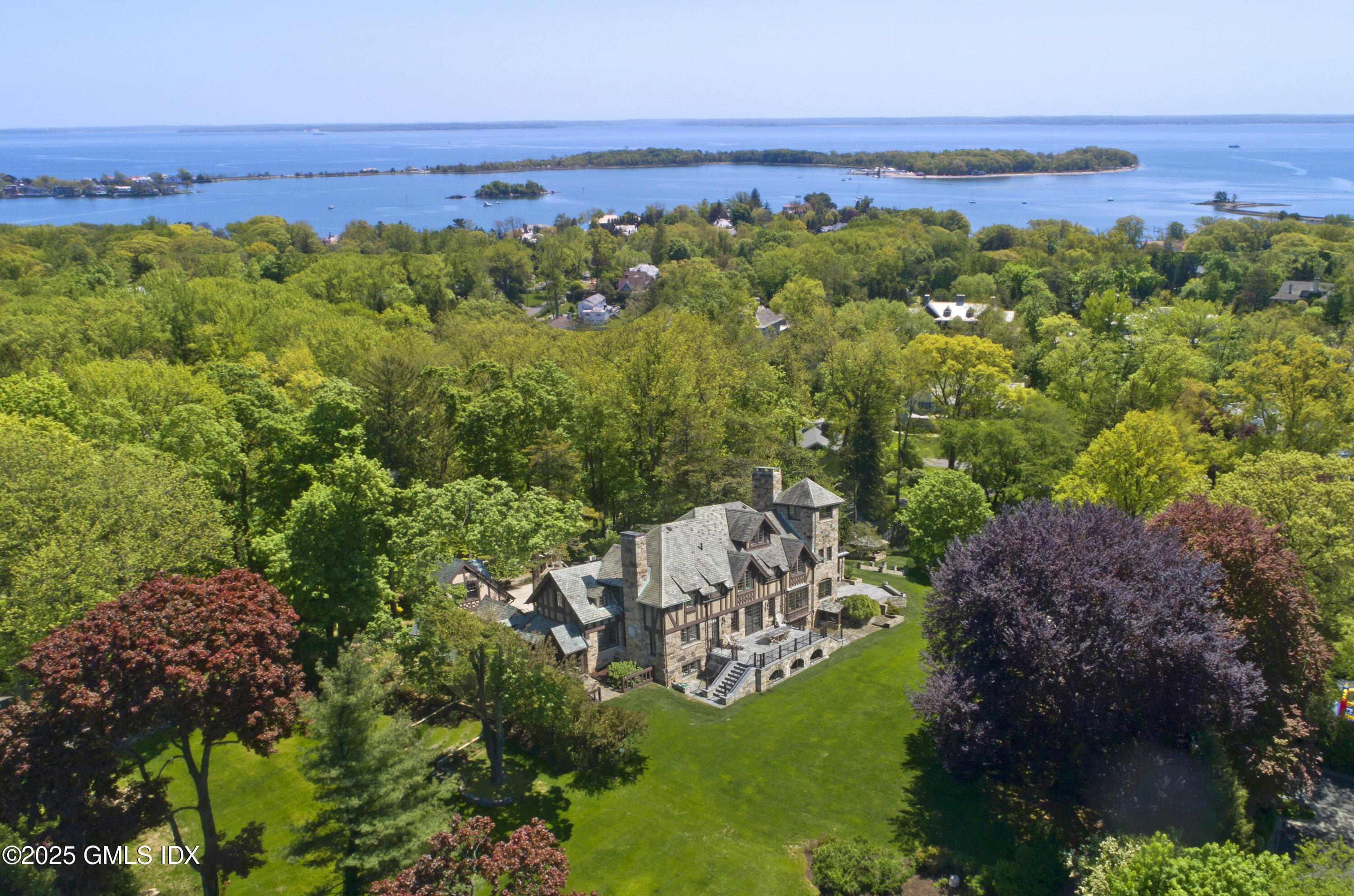 47 Carriglea Drive Riverside, CT 06878 - Photo 2 of 26 an aerial view of multiple house with a yard