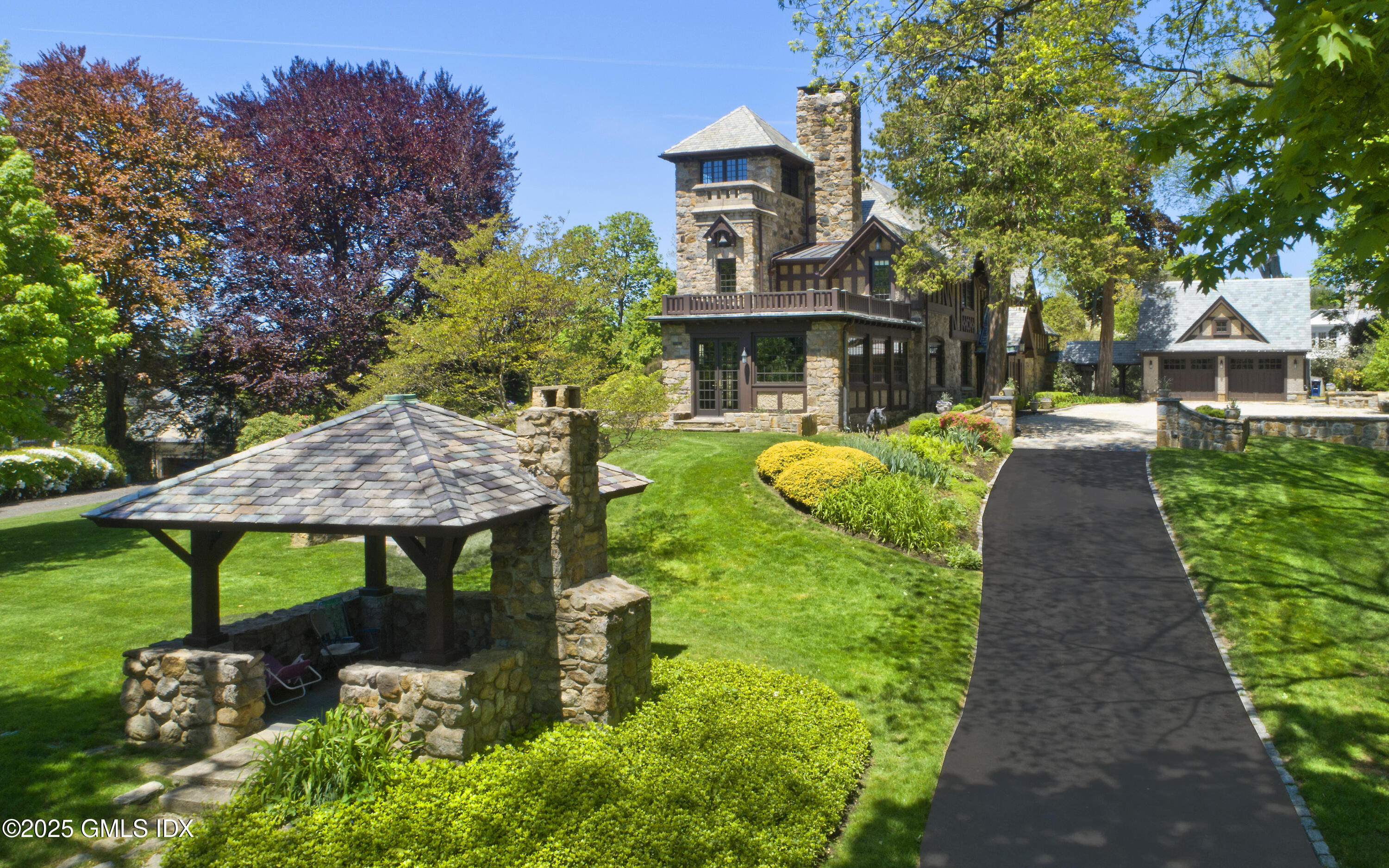 47 Carriglea Drive Riverside, CT 06878 - Photo 24 of 26 a front view of a house with garden