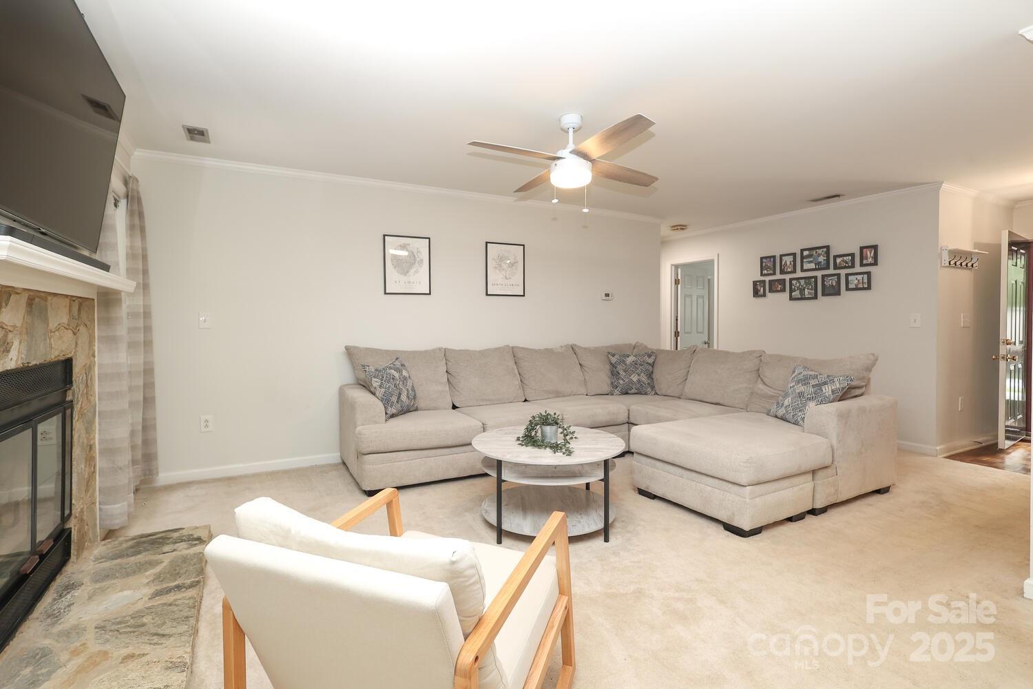 500 Sweetgum Drive, Unit 48C Fort Mill, SC 29715 - Photo 11 of 40 a living room with furniture a fireplace