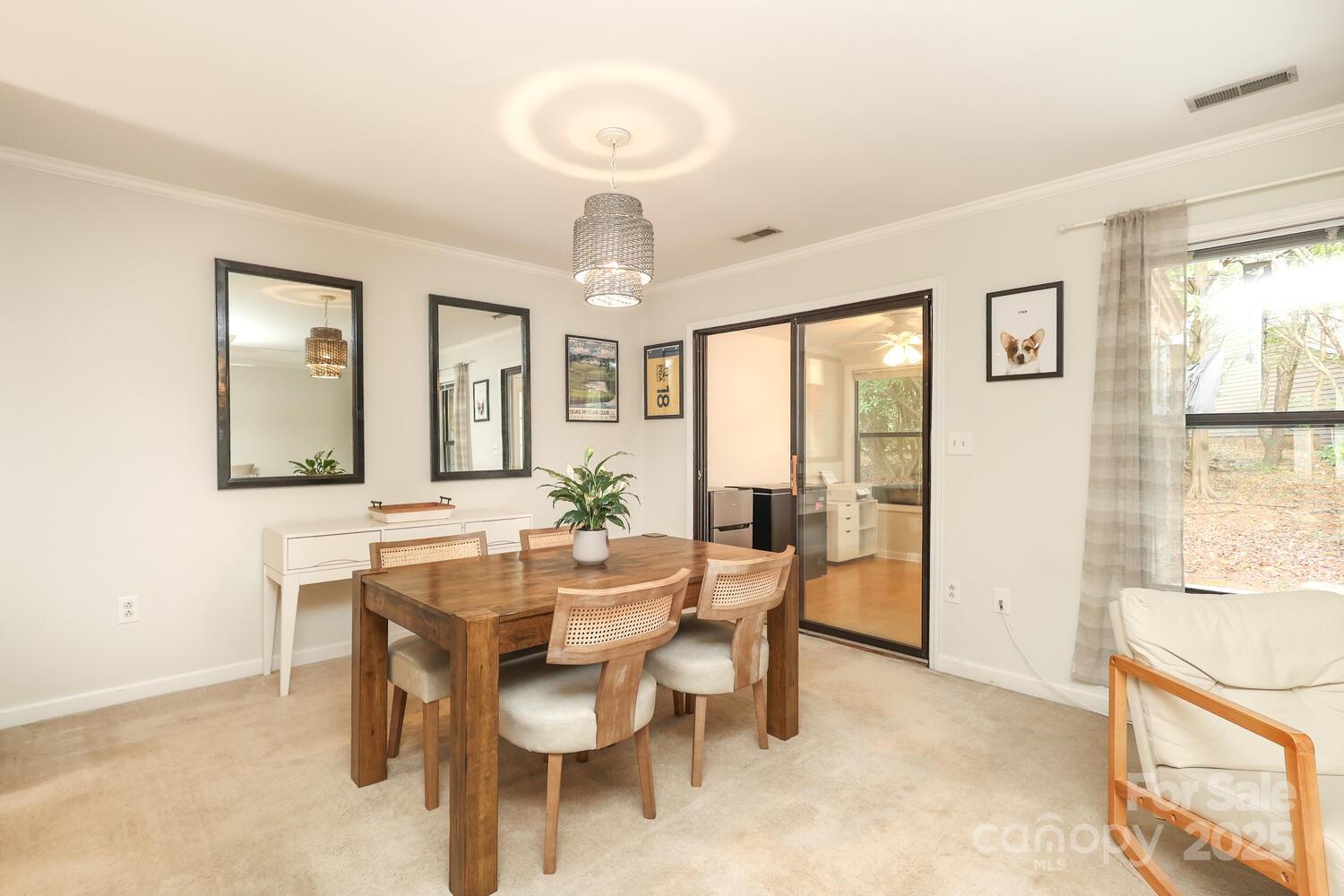 500 Sweetgum Drive, Unit 48C Fort Mill, SC 29715 - Photo 16 of 40 a view of a dining room with furniture window and outside view