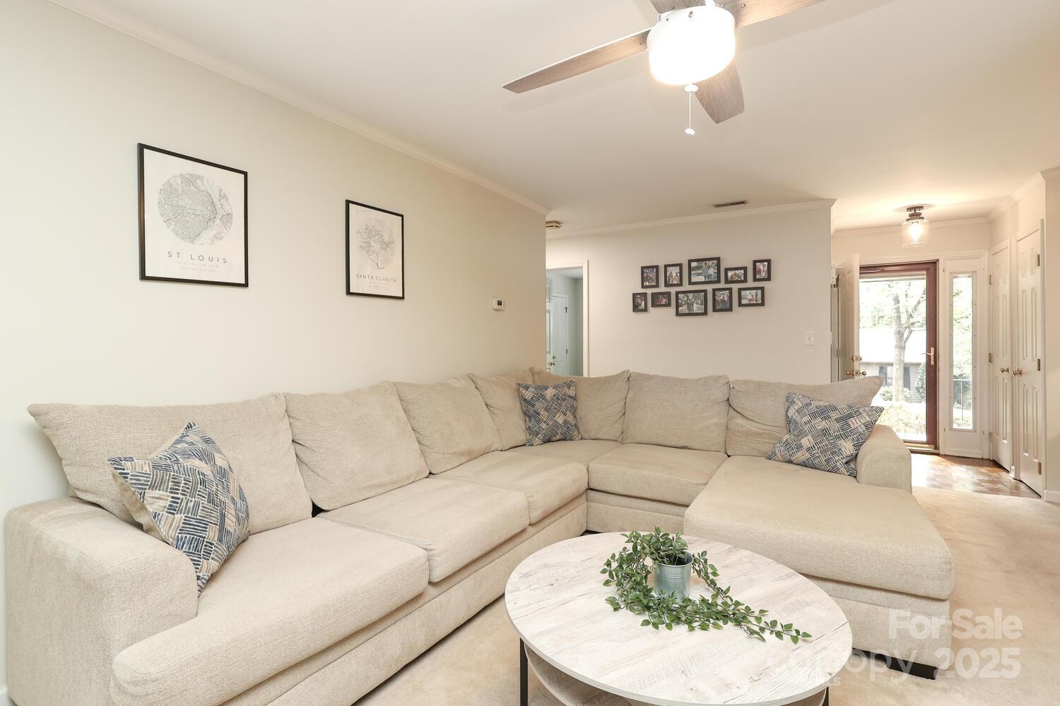 500 Sweetgum Drive, Unit 48C Fort Mill, SC 29715 - Photo 19 of 40 a living room with furniture and a large mirror
