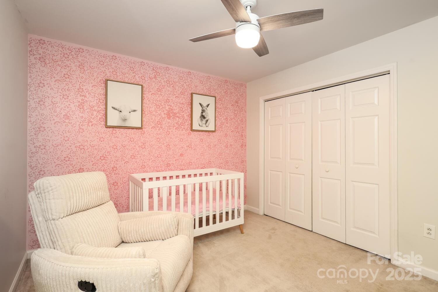 500 Sweetgum Drive, Unit 48C Fort Mill, SC 29715 - Photo 30 of 40 a bedroom with furniture and a window