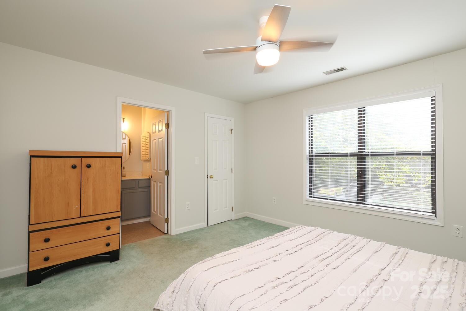 500 Sweetgum Drive, Unit 48C Fort Mill, SC 29715 - Photo 34 of 40 a bedroom with a bed and a window