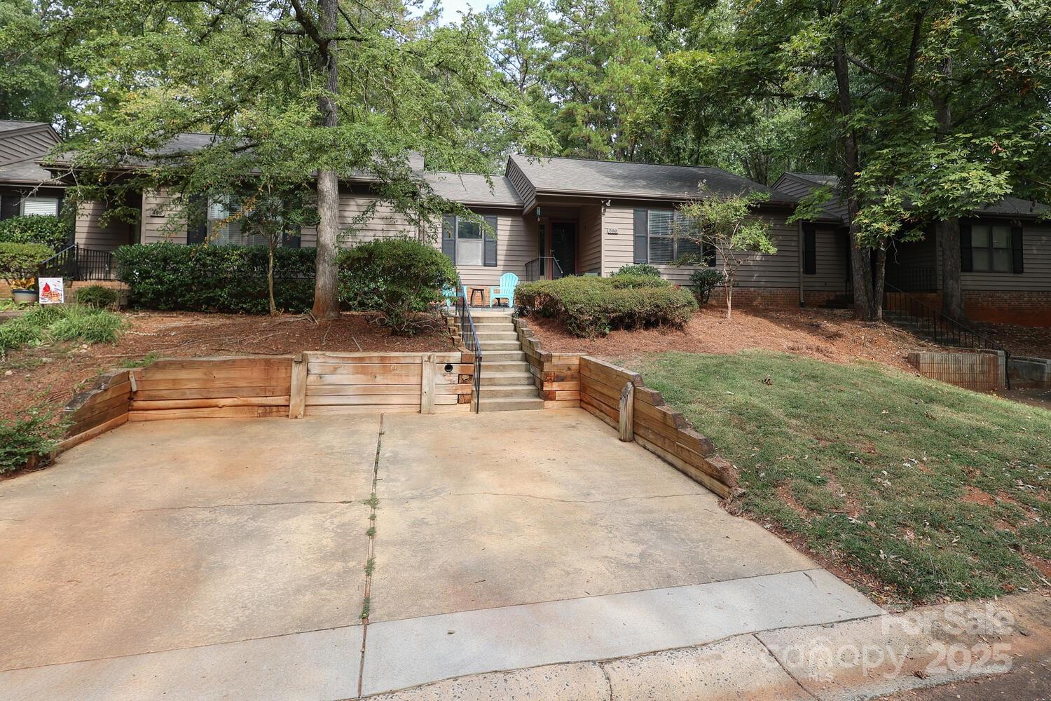500 Sweetgum Drive, Unit 48C Fort Mill, SC 29715 - Photo 39 of 40 a view of a house with backyard and a tree