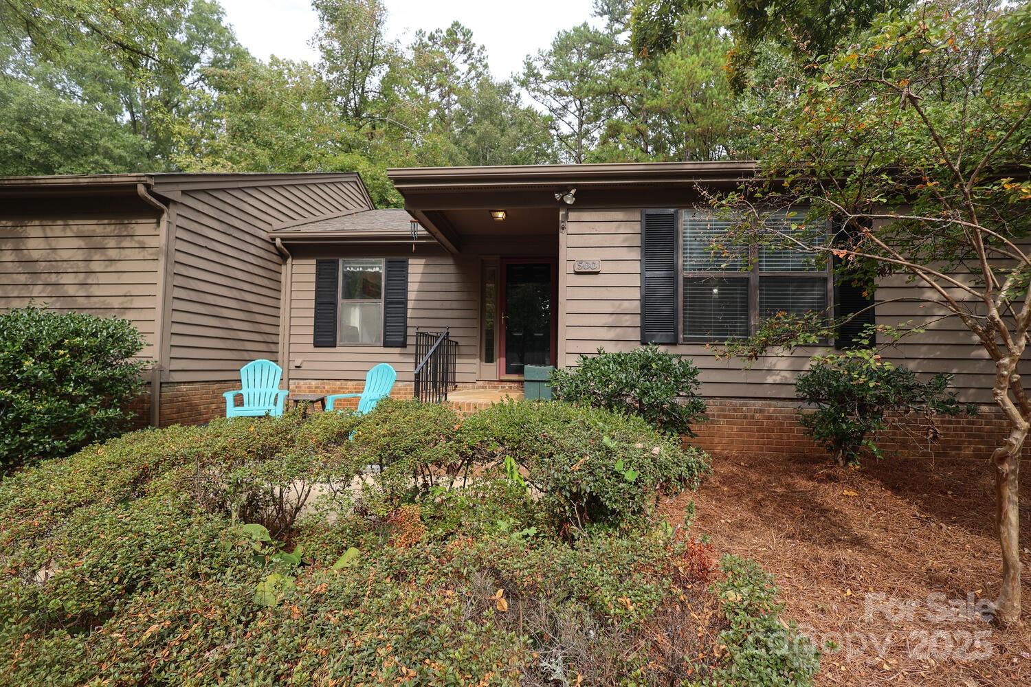 500 Sweetgum Drive, Unit 48C Fort Mill, SC 29715 - Photo 4 of 40 a front view of a house with garden