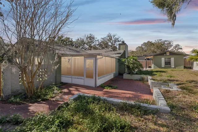 a view of a backyard with a garden