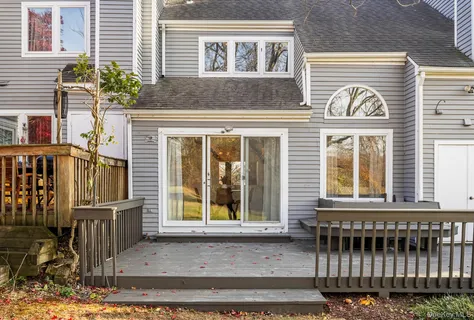 a front view of a house with a porch